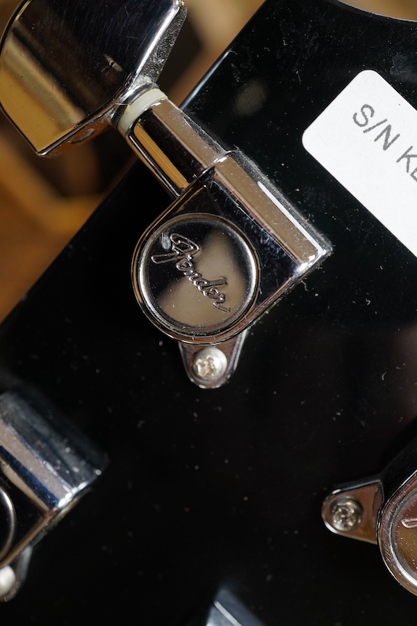 A Fender Resonator acoustic guitar. Condition - good.